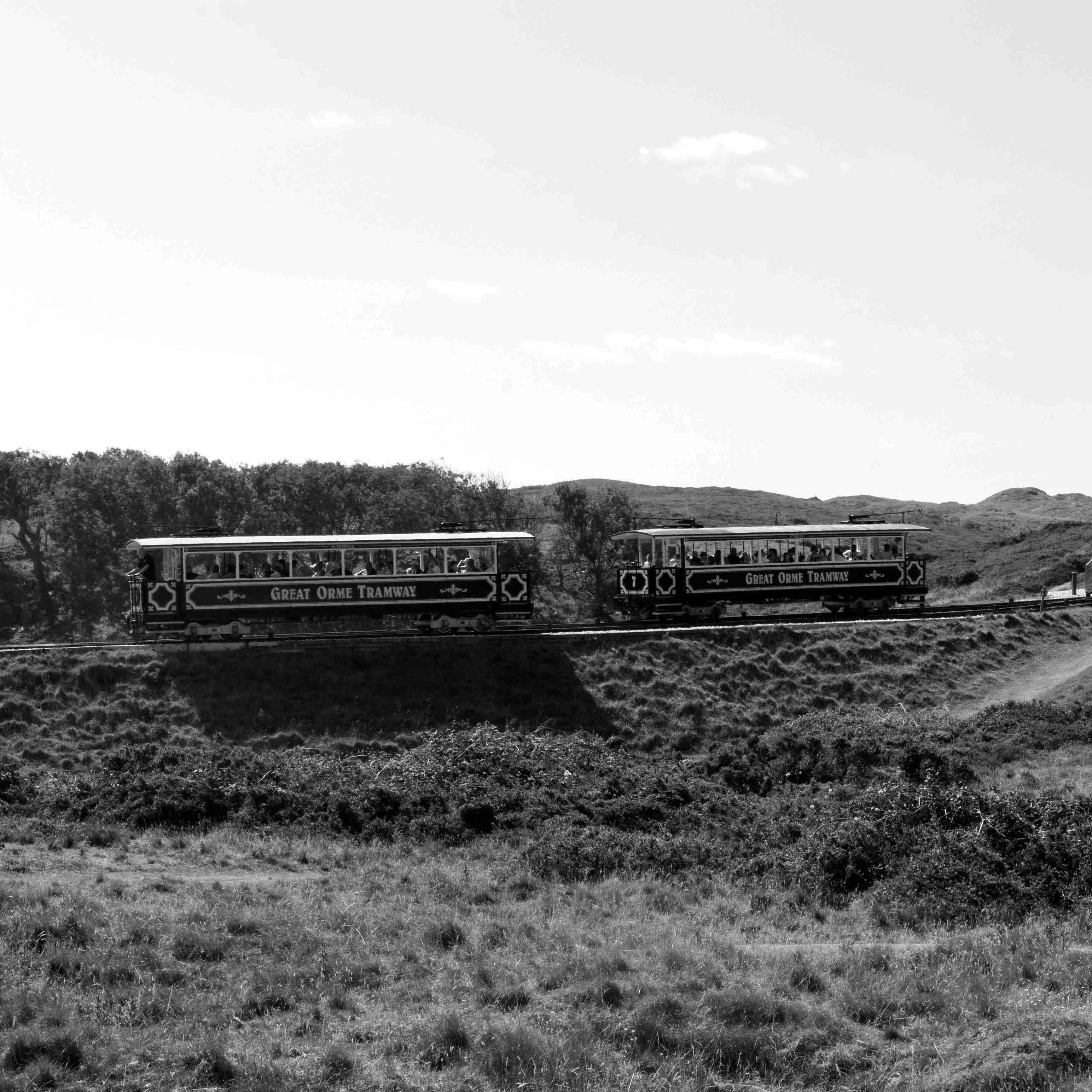 Two ends of a funicular tram having just passed one another