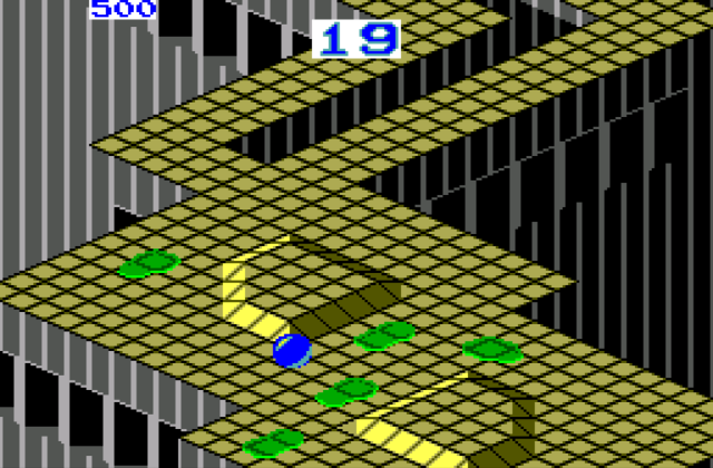 A screenshot of a marble rolling game from an isometric view. The blue marble is being navigated around an apple-green coloured course, and there are several pools of green acid on the course ahead, which the marble must avoid.