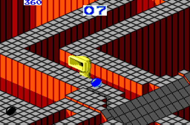 A screenshot of the blue marble rolling along narrow walkways with orange walls. There's a black 'enemy' marble on one of the walkways, and a yellow suction pipe poking up from behind one of the other walkways.