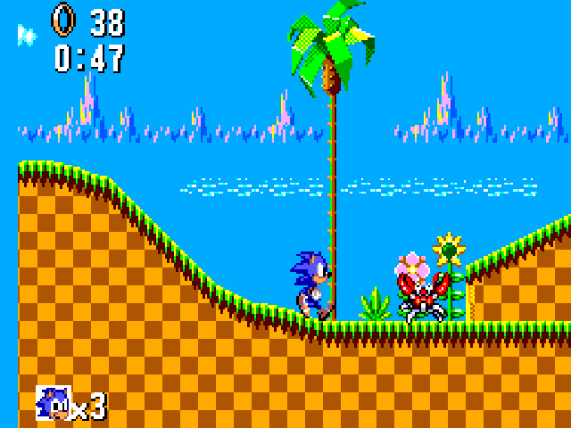 A screenshot of the 8-bit version of Sonic The Hedgehog, showing the familiar red robot crab enemy on Green Hill Zone in 8-bit form.