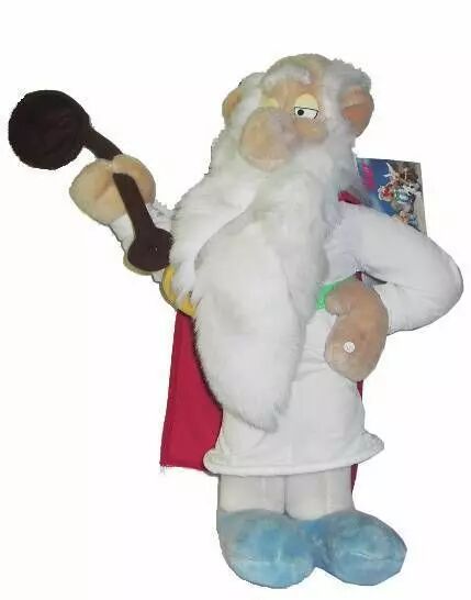 A plush toy of the druid Getafix, holding a large ladle.